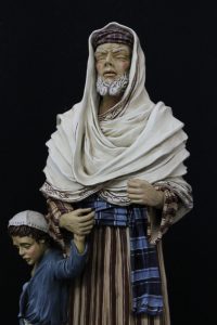 Anciano ciego con niño y niña con cordero. 40 cm. Año 2013. Colección Silvio Torilo.