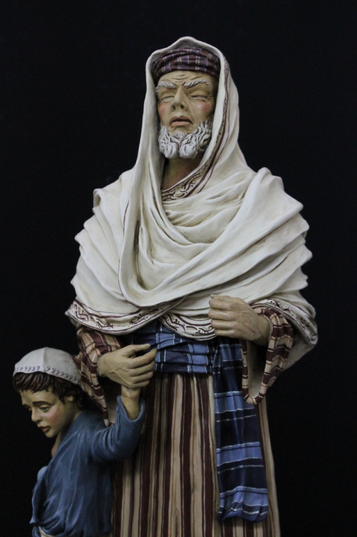 Anciano ciego con niño y niña con cordero. 40 cm. Año 2013. Colección Silvio Torilo.